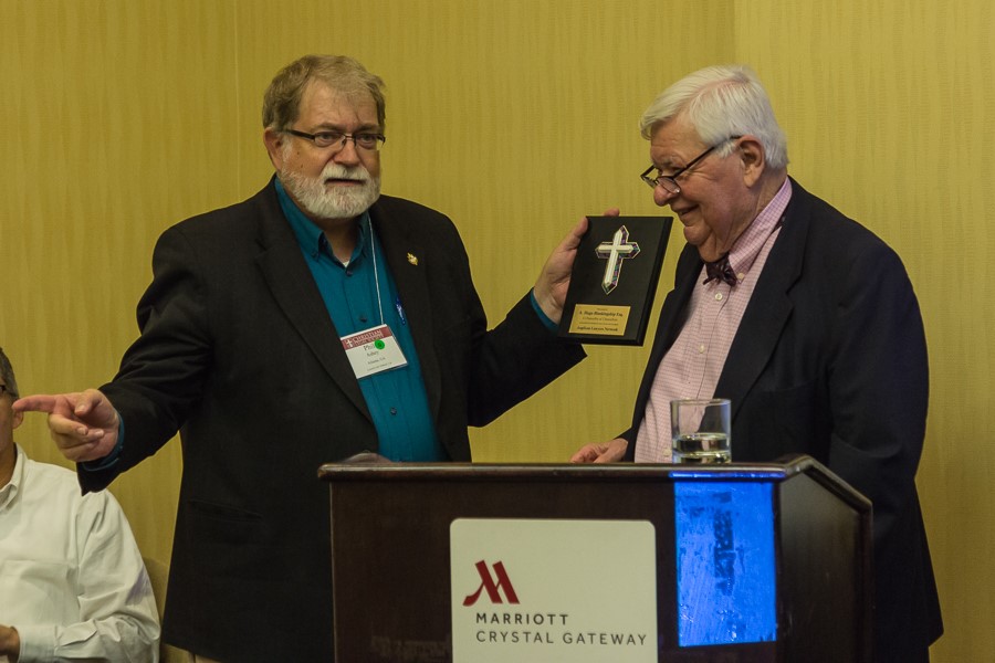 The Rev. Canon Phil Ashey (left) and the Anglican Lawyers Network honored Chancellor A. Hugo Blankenship for his faithful service to the Anglican Church in North America. 