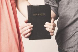 couple-holding-bible